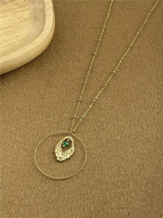 Ketting met cirkel en donkergroene hanger